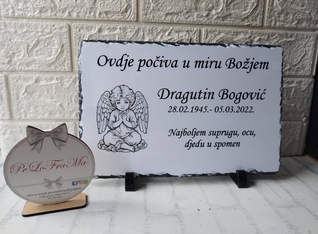 Spomen ploča s anđelom i osobnom posvetom